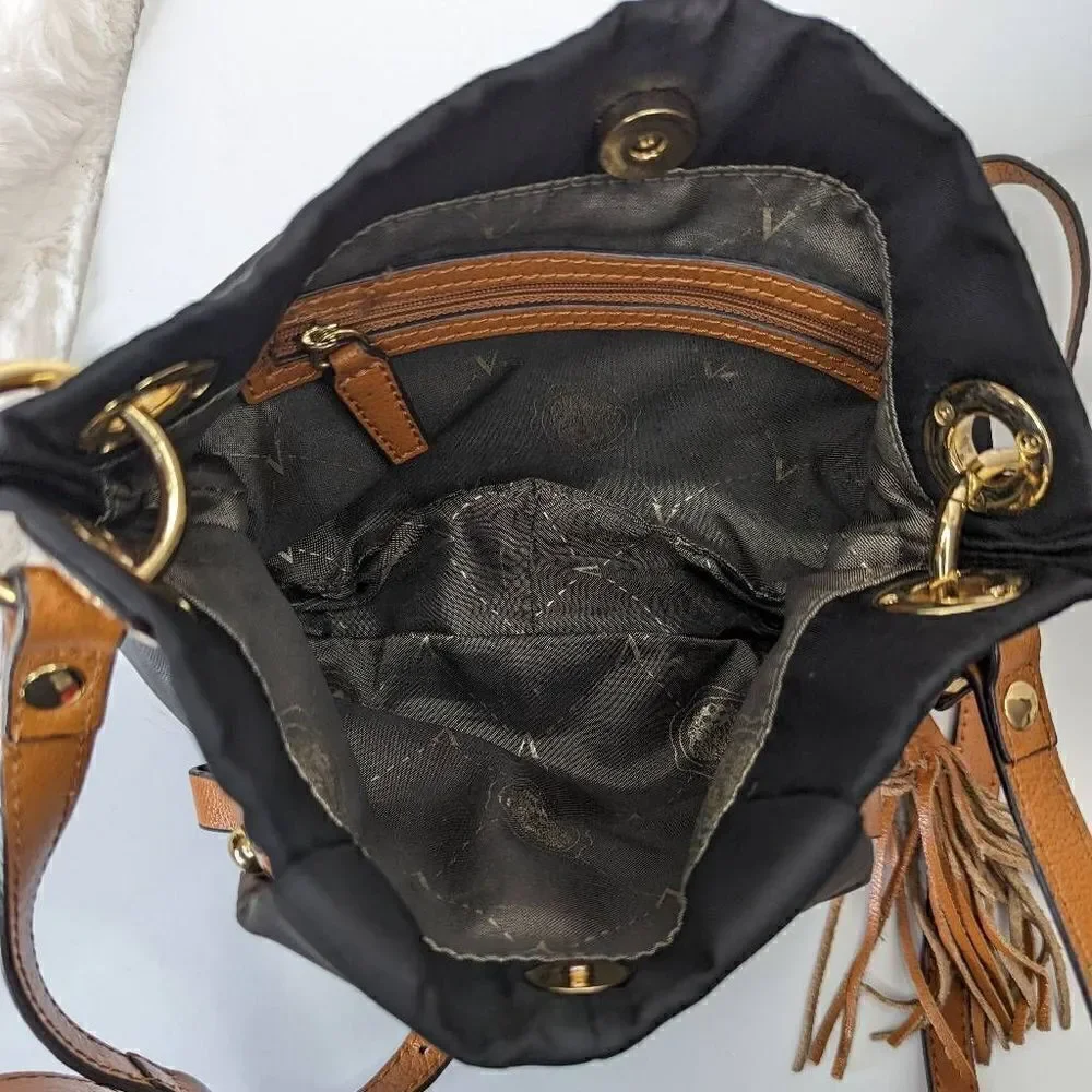 Vince Camuto Womens Sling Bag Adjustable Strap Tasseled Black and Brown